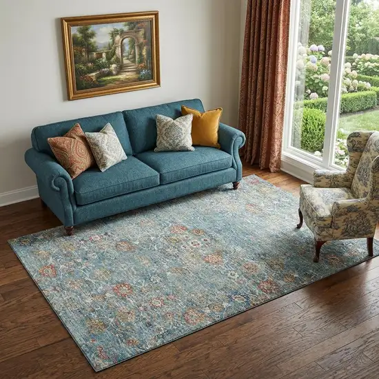 Blue Orange And Gold Floral Medallion Distressed Washable Area Rug With UV Protection Photo 1