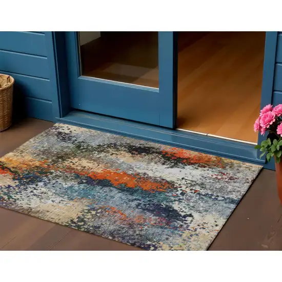 Blue Orange And Ivory Abstract Washable Indoor Outdoor Area Rug Photo 1