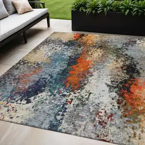 Photo of Blue Orange And Ivory Abstract Washable Indoor Outdoor Area Rug