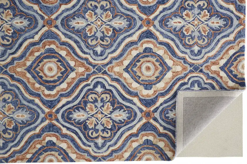 Blue Orange And Ivory Wool Floral Tufted Handmade Stain Resistant Area Rug Photo 3