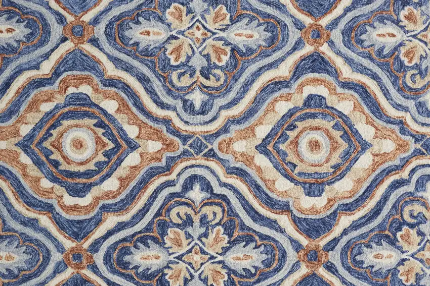 Blue Orange And Ivory Wool Floral Tufted Handmade Stain Resistant Area Rug Photo 9
