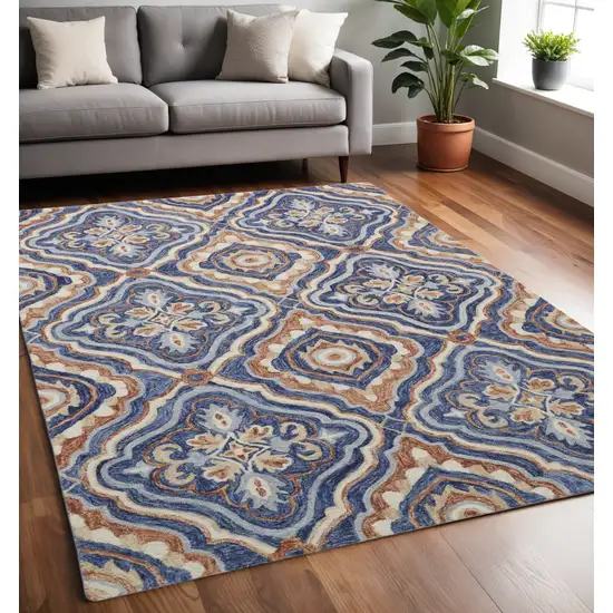 Blue Orange And Ivory Wool Geometric Tufted Handmade Stain Resistant Area Rug Photo 1