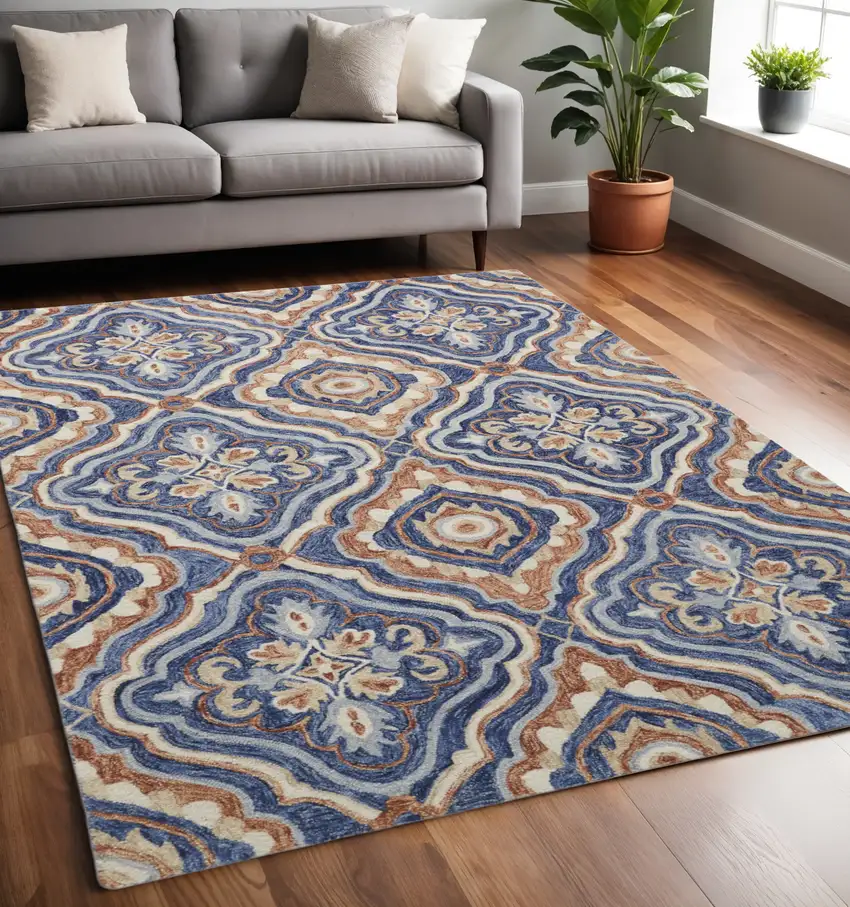 Blue Orange And Ivory Wool Geometric Tufted Handmade Stain Resistant Area Rug Photo 1