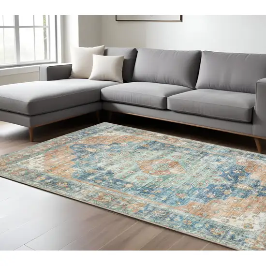 Rust And Blue Oriental Distressed Area Rug Photo 1