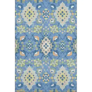 Photo of Blue Peach And Fern Green Oriental Washable Area Rug With UV Protection