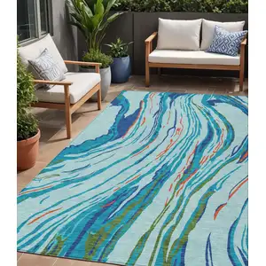 Photo of Blue Pink And Green Abstract Washable Indoor Outdoor Area Rug