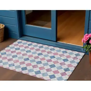 Photo of Blue Pink And Ivory Geometric Washable Indoor Outdoor Area Rug