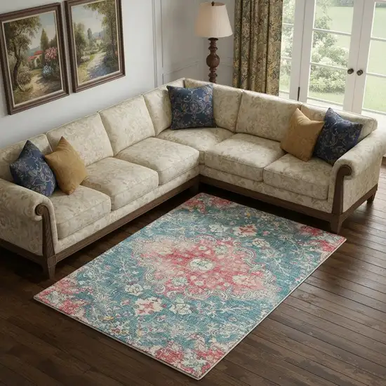 Blue Pink And Ivory Medallion Distressed Area Rug Photo 1