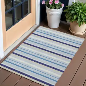 Photo of Blue Purple And Gray Striped Washable Indoor Outdoor Area Rug