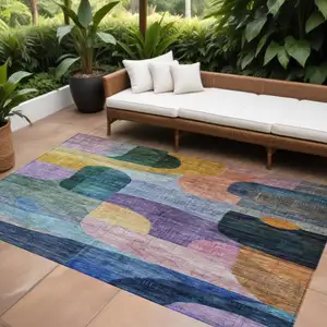 Photo of Blue Purple And Green Abstract Washable Indoor Outdoor Area Rug