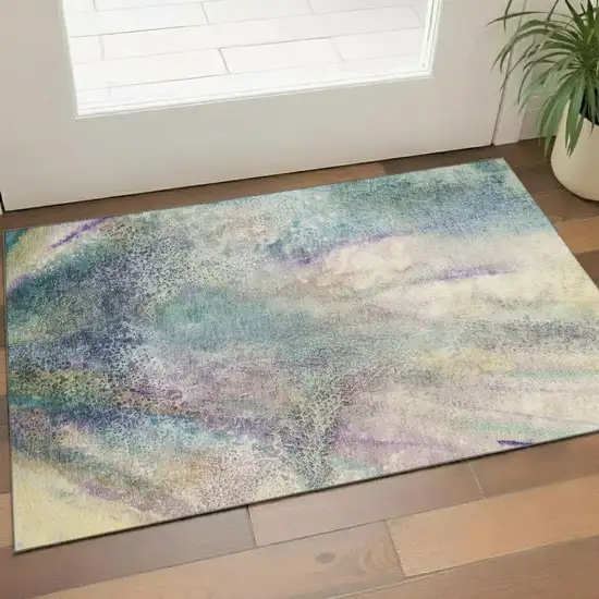 Blue Purple And Ivory Abstract Washable Area Rug With UV Protection Photo 1