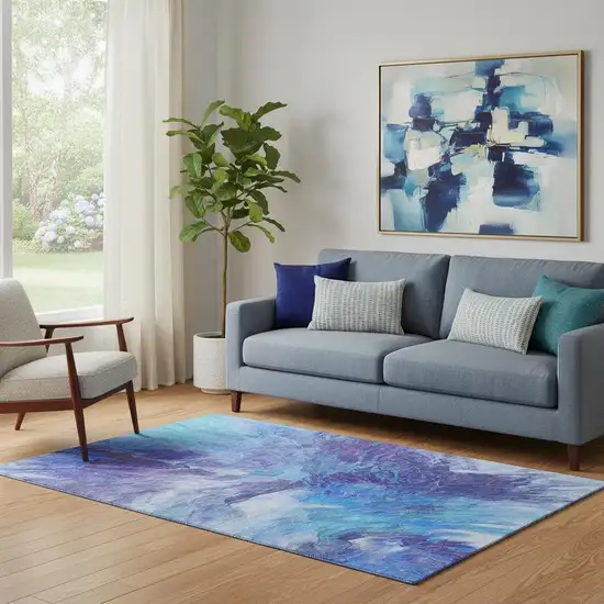 Blue Purple And Ivory Abstract Washable Area Rug With UV Protection Photo 1