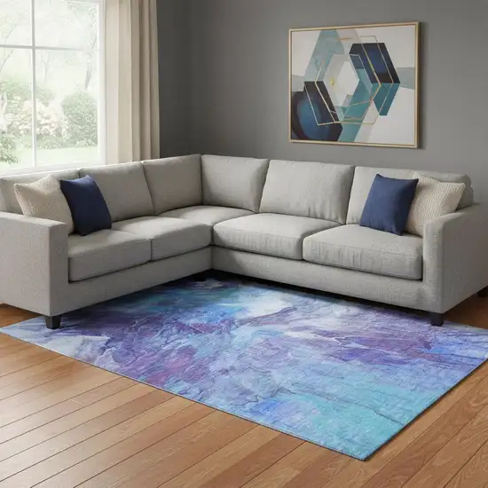 Blue Purple And Ivory Abstract Washable Area Rug With UV Protection Photo 1