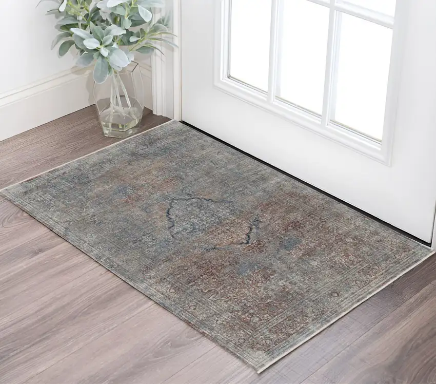 Blue and Gray Floral Power Loom Area Rug Photo 1