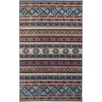 Photo of Blue Red And Ivory Geometric Power Loom Distressed Stain Resistant Area Rug