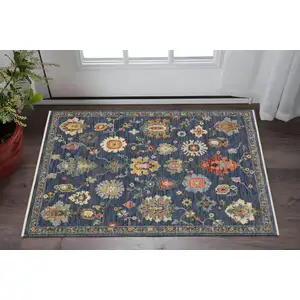 Photo of Blue Red And Ivory Oriental Area Rug With Fringe