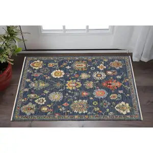 Photo of Blue Red And Ivory Oriental Area Rug With Fringe