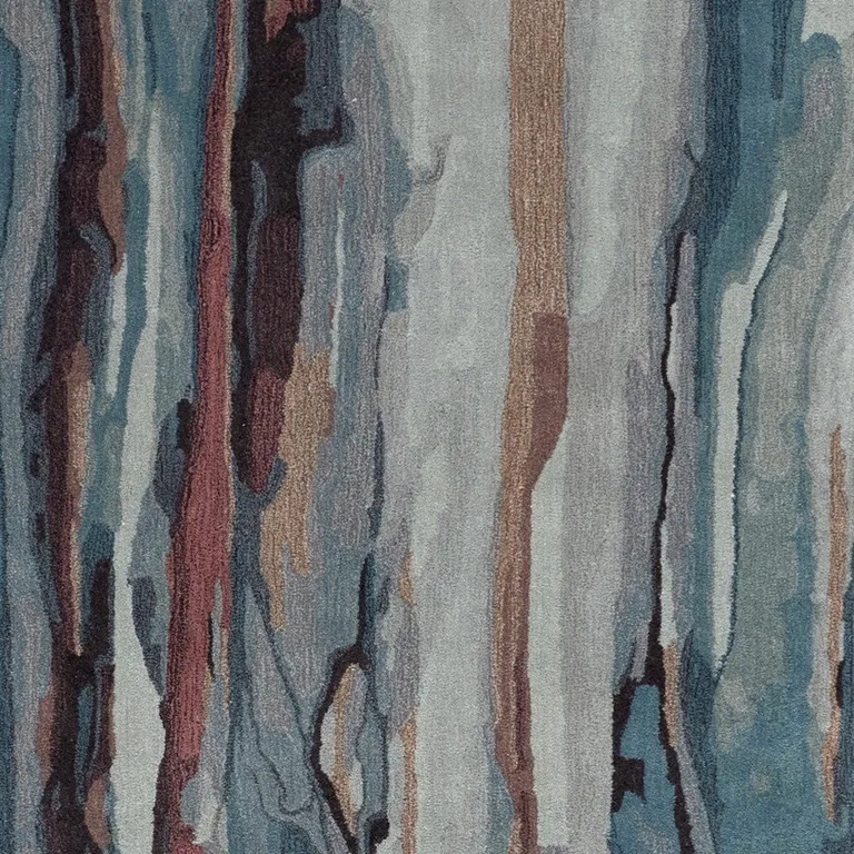 Blue Red And Ivory Wool Abstract Tufted Handmade Stain Resistant Area Rug Photo 5