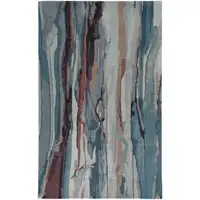 Photo of Blue Red And Ivory Wool Abstract Tufted Handmade Stain Resistant Area Rug