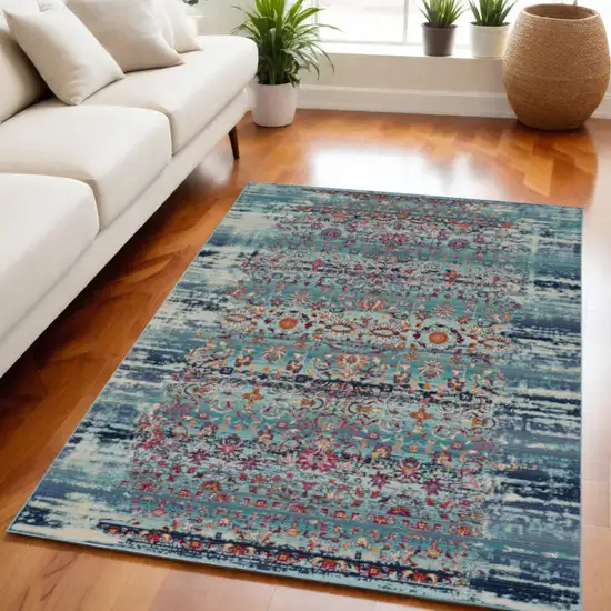 Blue Red And Orange Floral Distressed Area Rug Photo 1