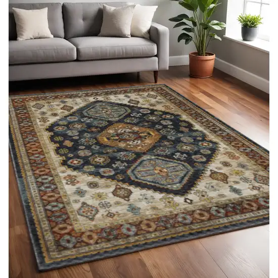 Blue Red Beige Orange Gold And Tan Oriental Power Loom Stain Resistant Area Rug With Fringe Photo 1