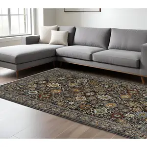 Photo of Blue Red Beige Orange Green And Rust Oriental Power Loom Stain Resistant Area Rug With Fringe