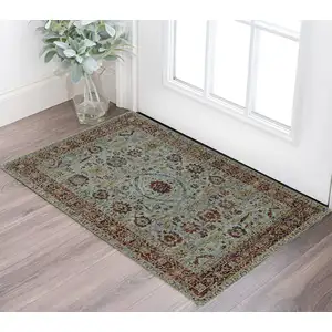 Photo of Blue Red Green And Gold Oriental Power Loom Stain Resistant Area Rug