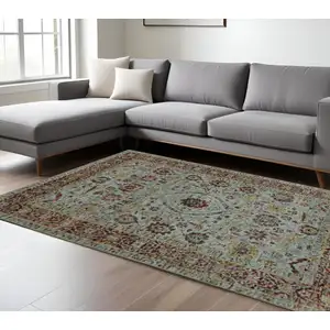 Photo of Blue Red Green And Gold Oriental Power Loom Stain Resistant Area Rug