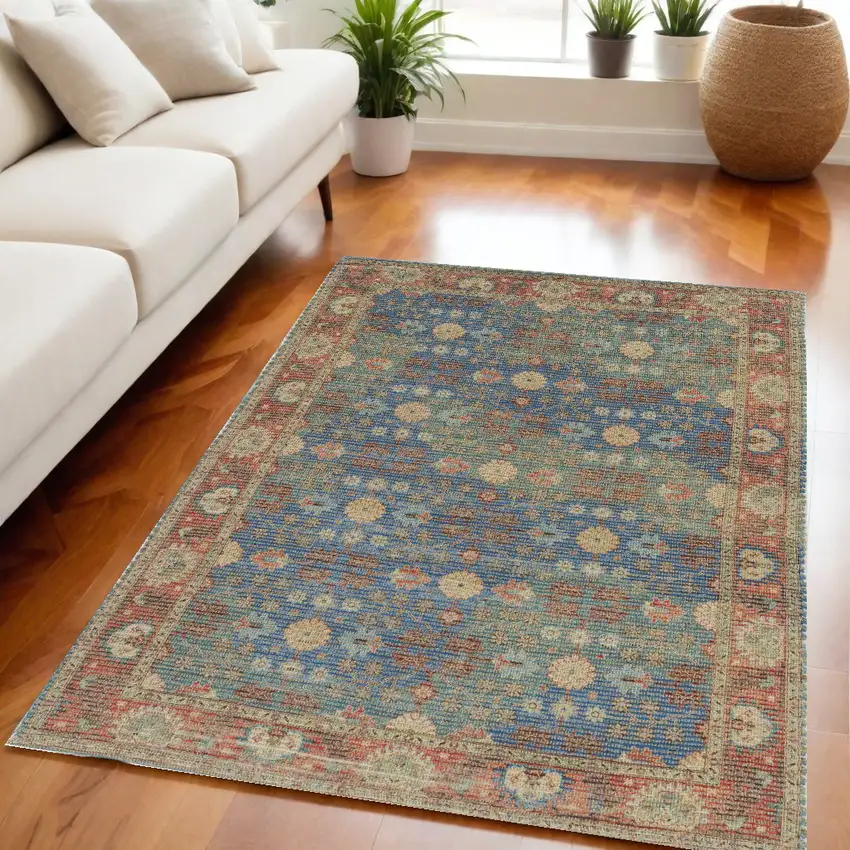 Blue and Beige Floral Hand Woven Distressed Area Rug Photo 1