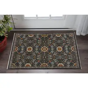 Photo of Blue Red Ivory And Gold Oriental Power Loom Stain Resistant Area Rug With Fringe