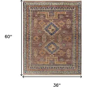 Photo of Blue Red and Tan Wool Geometric Hand Knotted Area Rug With Fringe