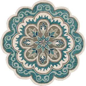 Photo of Blue Round Wool Floral Hand Tufted Area Rug