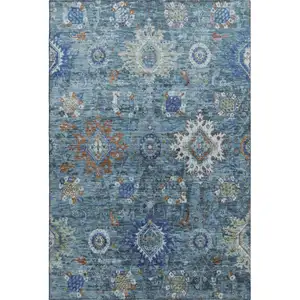 Photo of Blue Rust And Ivory Oriental Washable Area Rug With UV Protection