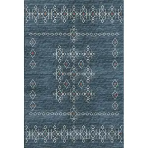 Photo of Blue Rust And Ivory Tribal Washable Area Rug With UV Protection