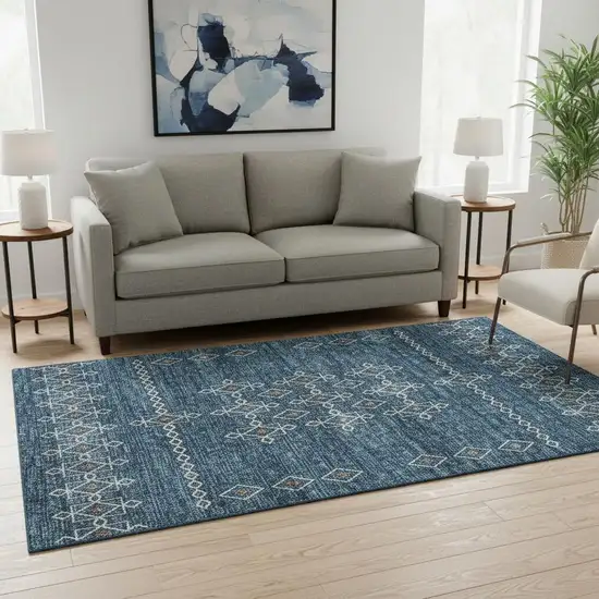 Blue Rust And Ivory Tribal Washable Area Rug With UV Protection Photo 1