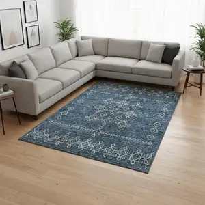 Photo of Blue Rust And Ivory Tribal Washable Area Rug With UV Protection
