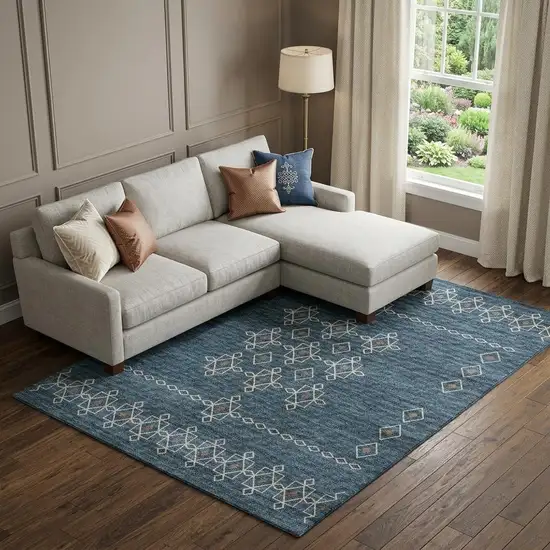 Blue Rust And Ivory Tribal Washable Area Rug With UV Protection Photo 1