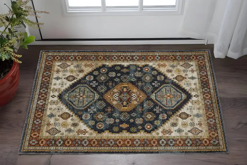 Blue Rust Red Beige Orange Gold And Tan Oriental Power Loom Stain Resistant Area Rug With Fringe Photo 1