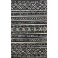 Photo of Blue Tan And Black Geometric Power Loom Distressed Stain Resistant Area Rug
