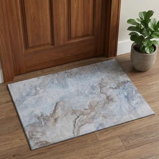 Blue Taupe And Beige Abstract Washable Area Rug With UV Protection Photo 1