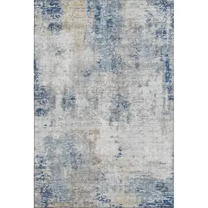 Photo of Blue Taupe And Ivory Abstract Washable Area Rug With UV Protection