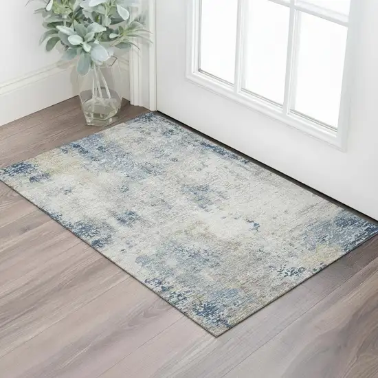 Blue Taupe And Ivory Abstract Washable Area Rug With UV Protection Photo 1