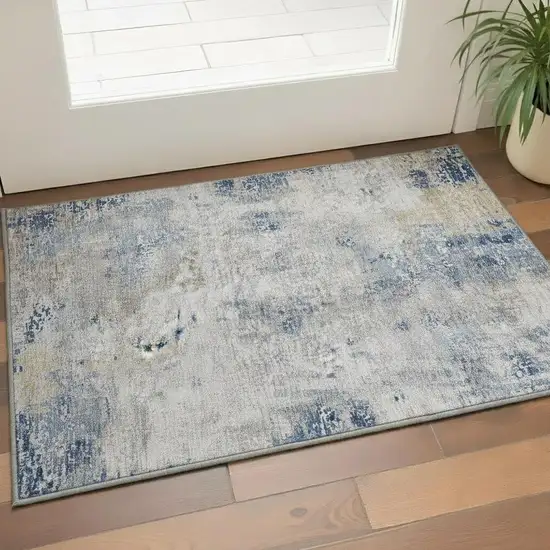 Blue Taupe And Ivory Abstract Washable Area Rug With UV Protection Photo 2