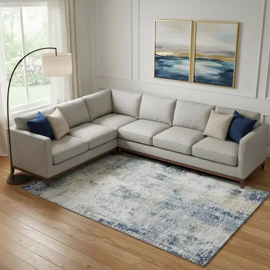 Blue Taupe And Ivory Abstract Washable Area Rug With UV Protection Photo 1