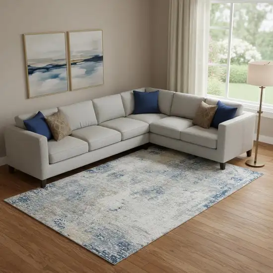 Blue Taupe And Ivory Abstract Washable Area Rug With UV Protection Photo 1