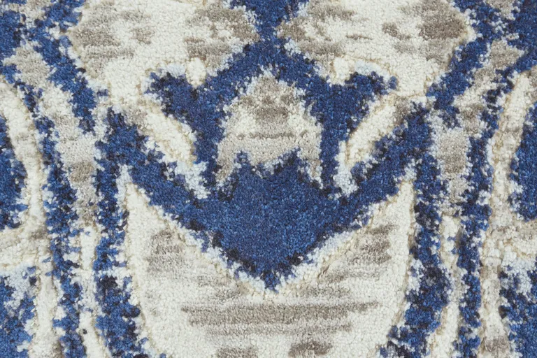 Blue Taupe And Ivory Round Ikat Distressed Stain Resistant Area Rug Photo 3