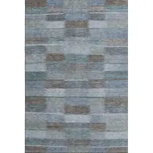 Photo of Blue Teal And Brown Striped Washable Area Rug With UV Protection