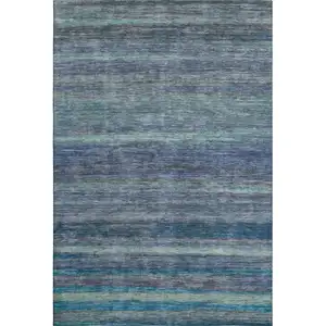 Photo of Blue Teal And Gray Striped Washable Area Rug With UV Protection