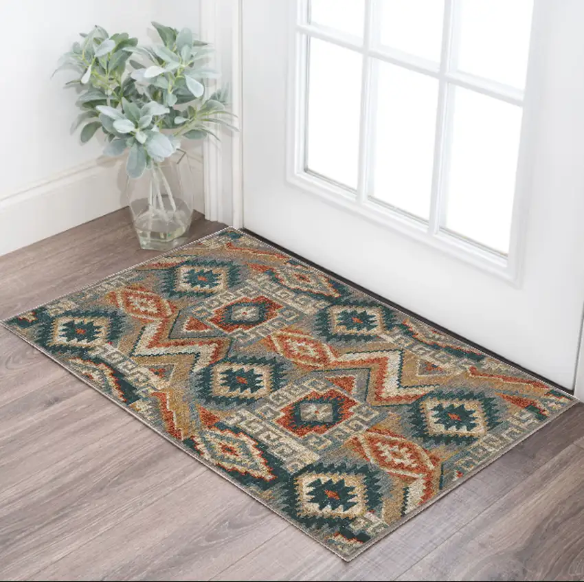 Blue Teal Grey Orange Gold Ivory And Rust Geometric Power Loom Stain Resistant Area Rug Photo 1