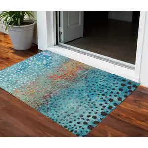 Photo of Blue Terra Cotta And Black Abstract Washable Indoor Outdoor Area Rug